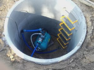 Krecik wiercenie studni usługi koparką i minikoparką - pompa wodna